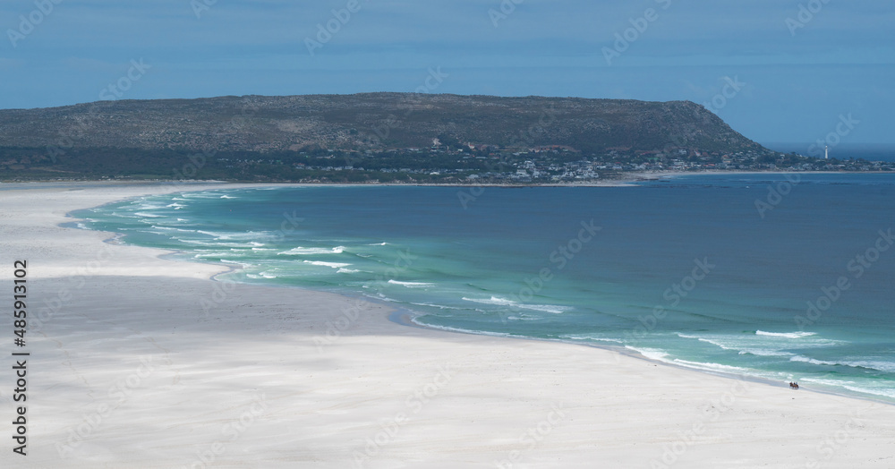 Two isolated horse riders on Noordhoek, Long Beach, South Africa. Two isolated horse riders on Noordhoek, Long Beach, South Africa.