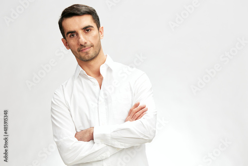 handsome man in white shirts hand gesture copy-space light background