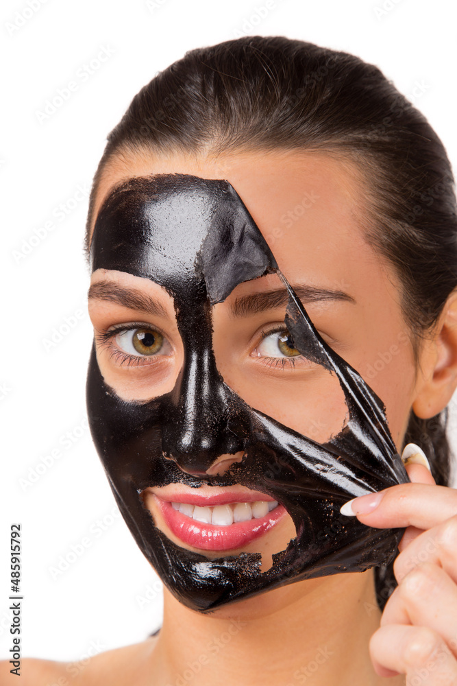 Beauty portrait of brunette woman. Skin care, black mask. Beauty portrait of brunette woman. Skin care, black mask.