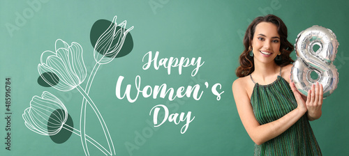 Smiling young woman with ba...