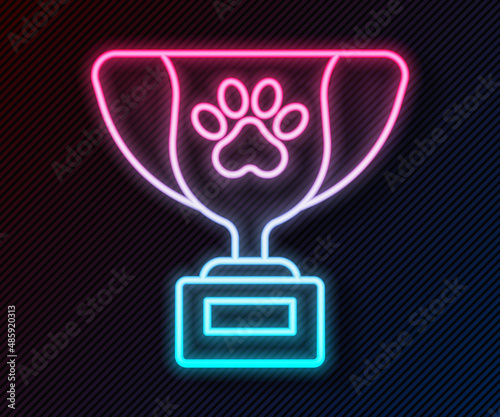Glowing neon line Pet award symbol icon isolated on black background. Medal with dog footprint as pets exhibition winner concept. Vector