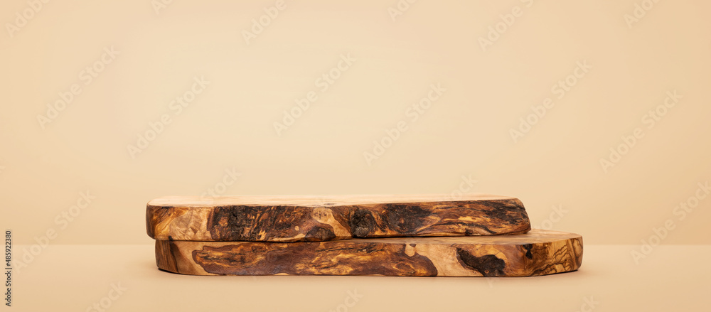 Fototapeta premium Two wood pieces pedestals. Background for food, perfume, jewellery and cosmetic products. Front view.