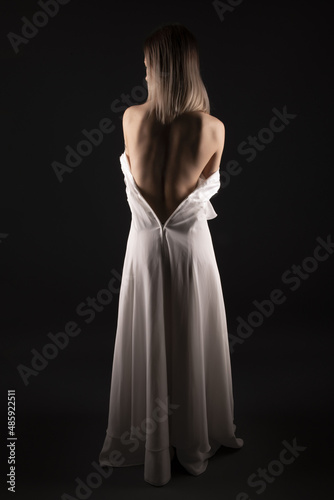 portrait of sexy beauty woman in white dress