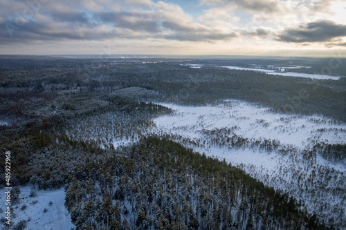 aerial view forest tundra taiga road in the forest in winter on a sunny frosty day in siberia. High quality photo © Dmitriy Mazepa