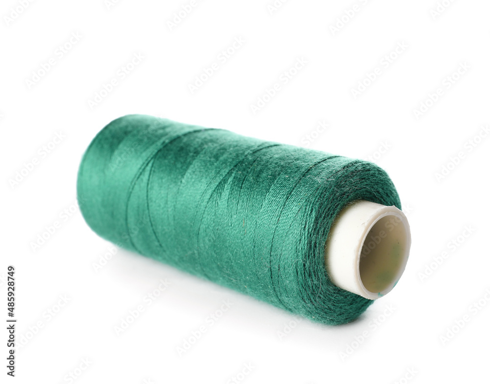 Bright sewing thread spool on white background Bright sewing thread spool on white background