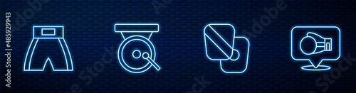 Set line Boxing training paws, short, gong and glove. Glowing neon icon on brick wall. Vector