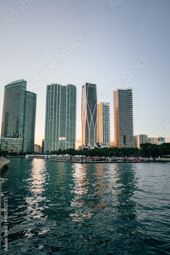 city skyline at sunset downtown miami reflections water 