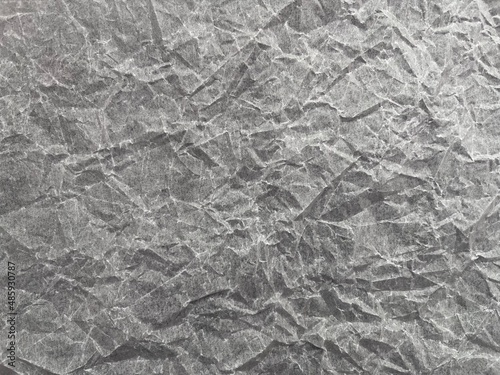 gray background of crumpled paper
