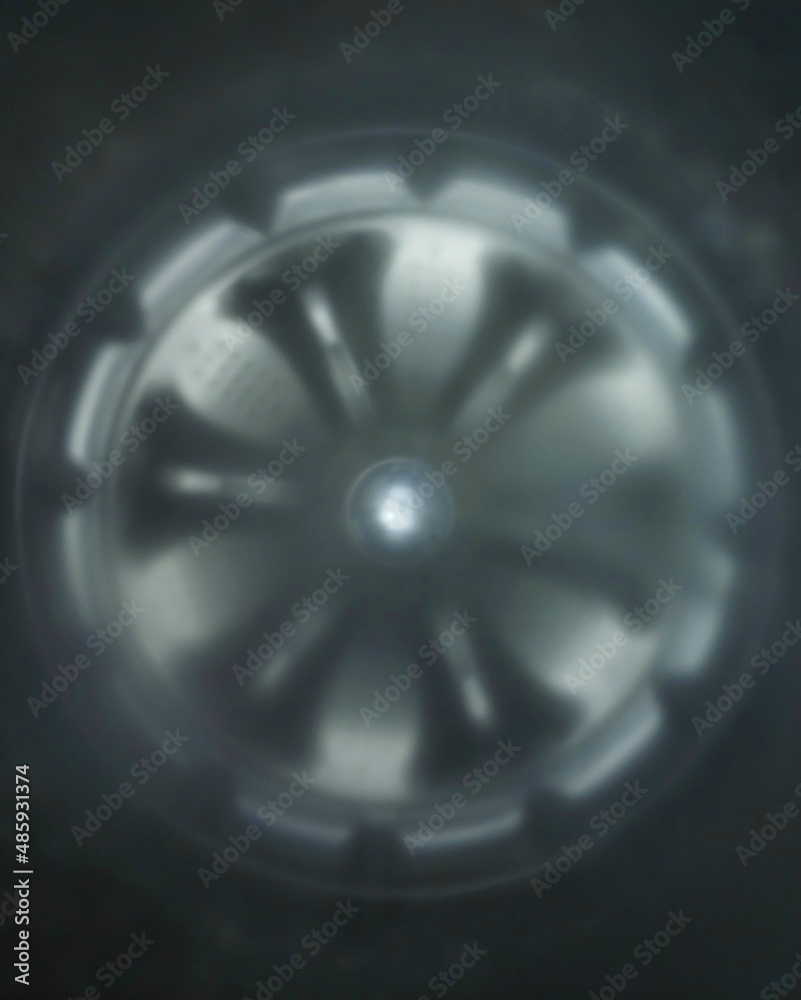 Inside of a washing machine tub looking from above Inside of a washing machine tub looking from above