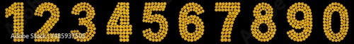 Set of arabic numbers from natural yellow flowers of tansy, isolated on black background