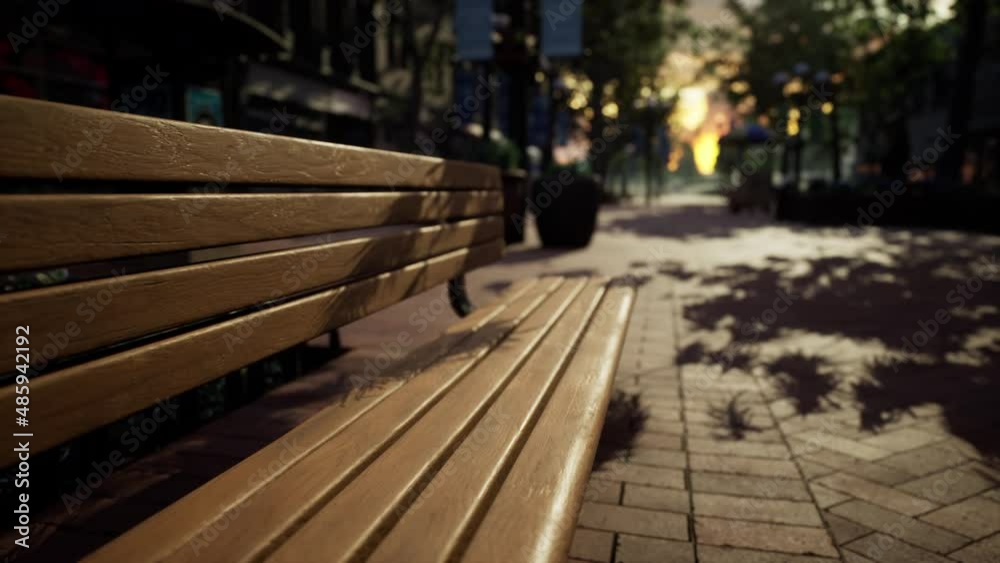 Park bench in downtown on a cloudy afternoon Park bench in downtown on a cloudy afternoon