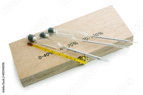 Photos Three hydrometers for measuring degree of alcohol  in white background