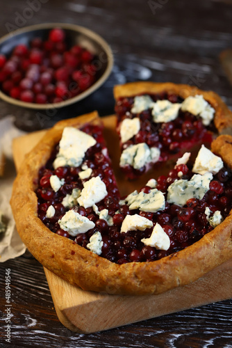 Homemade galette with cranberries and blue cheese.
