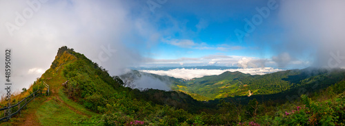 Panorama mountains with fog and sky.