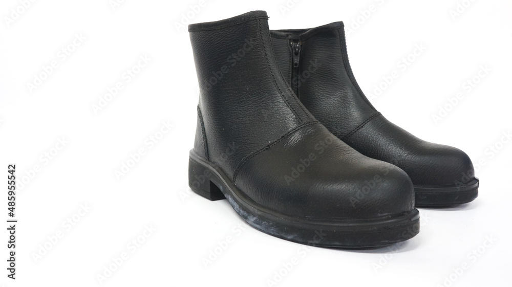 Photo of black safety shoes, these shoes are made of leather, this photo has a white background Photo of black safety shoes, these shoes are made of leather, this photo has a white background