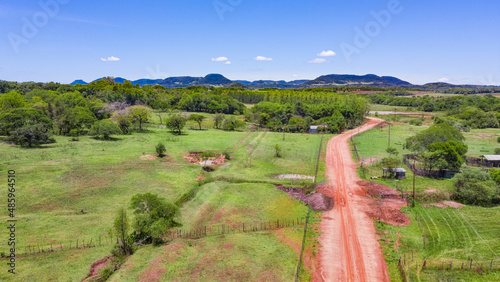 Aerial view of a landscape in Paraguay, here near Colonia Independencia with a view of the Ybytyruzu Mountains. . photo