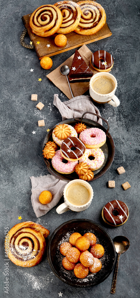 Table with various cookies, donuts, cakes and coffe cups Table with various cookies, donuts, cakes and coffe cups