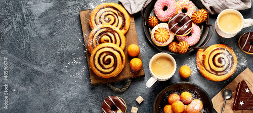 Canvas Print Table with various cookies, donuts, cakes and coffe cups