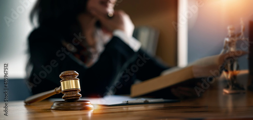 Lawyer working in office. Law and justice concept. Dark tone color background.