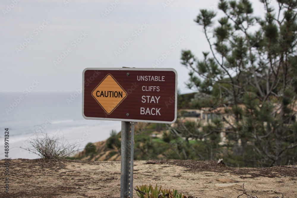 Warning sign on cliff edge