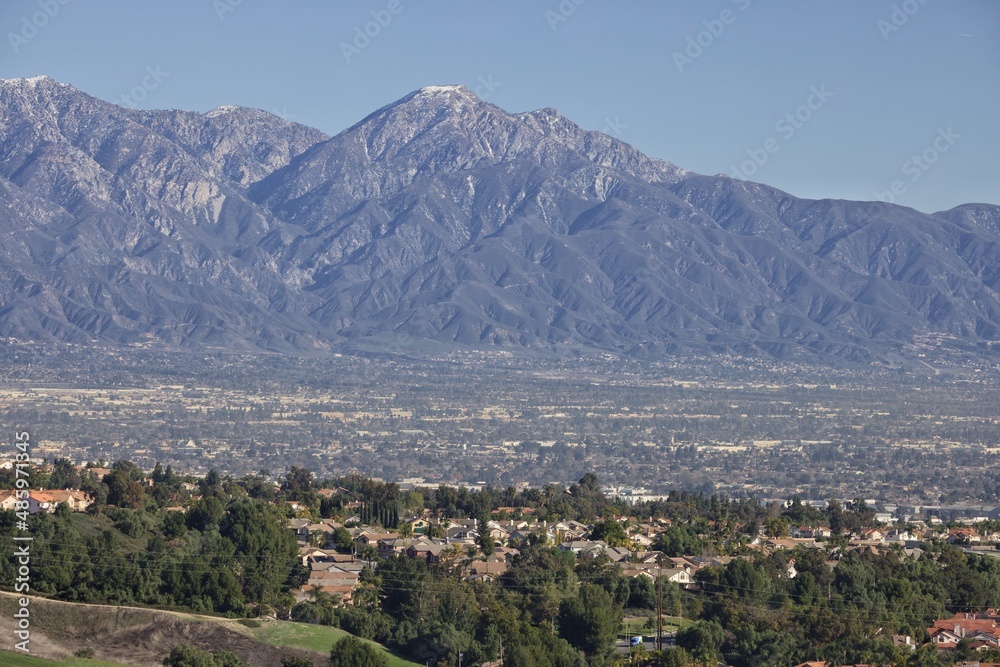 Snow capped mountain range overlooking California