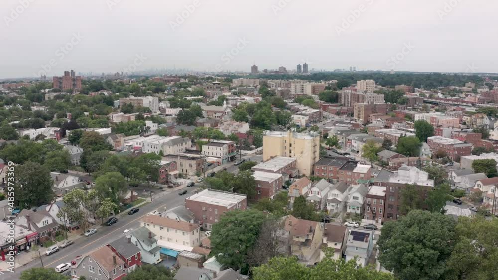 Camera moves forward over Bronx suburb. Camera moves forward over Bronx suburb.