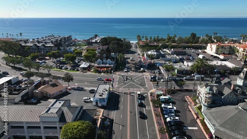 Aerial drone shot over a beautiful downtown Carlsbad headed towards the ocean in  Carlsbad, California, USA. photo