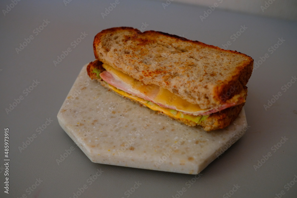 rye bread, bacon, cheese, mayonnaise sandwich