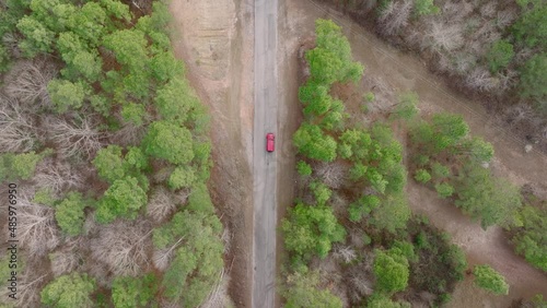 Cinematic Top Down Shot of a Jeep on a Residential Rural Road photo