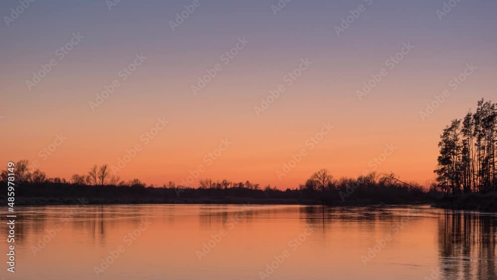 Sunset sky over the river timelapse 4K Sunset sky over the river timelapse 4K