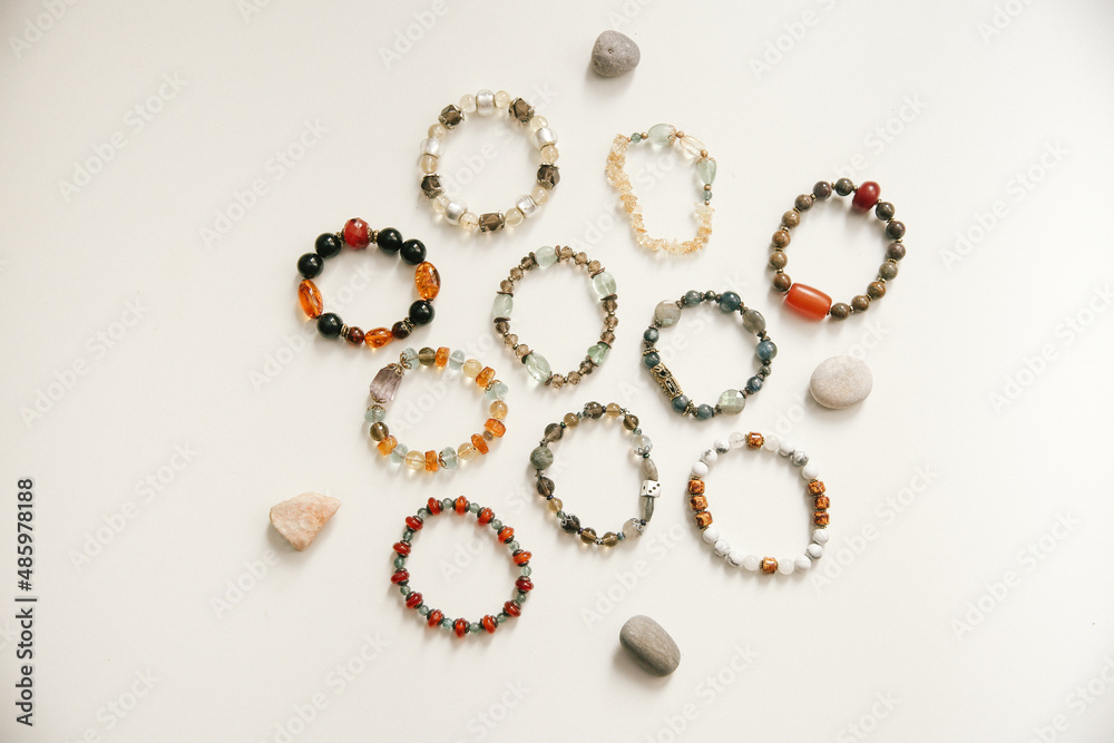 Jewelry and bracelets made of natural stones, natural minerals, top view and place for text Jewelry and bracelets made of natural stones, natural minerals, top view and place for text