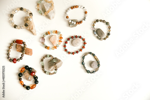 Jewelry and bracelets made of natural stones, natural minerals, top view and place for text