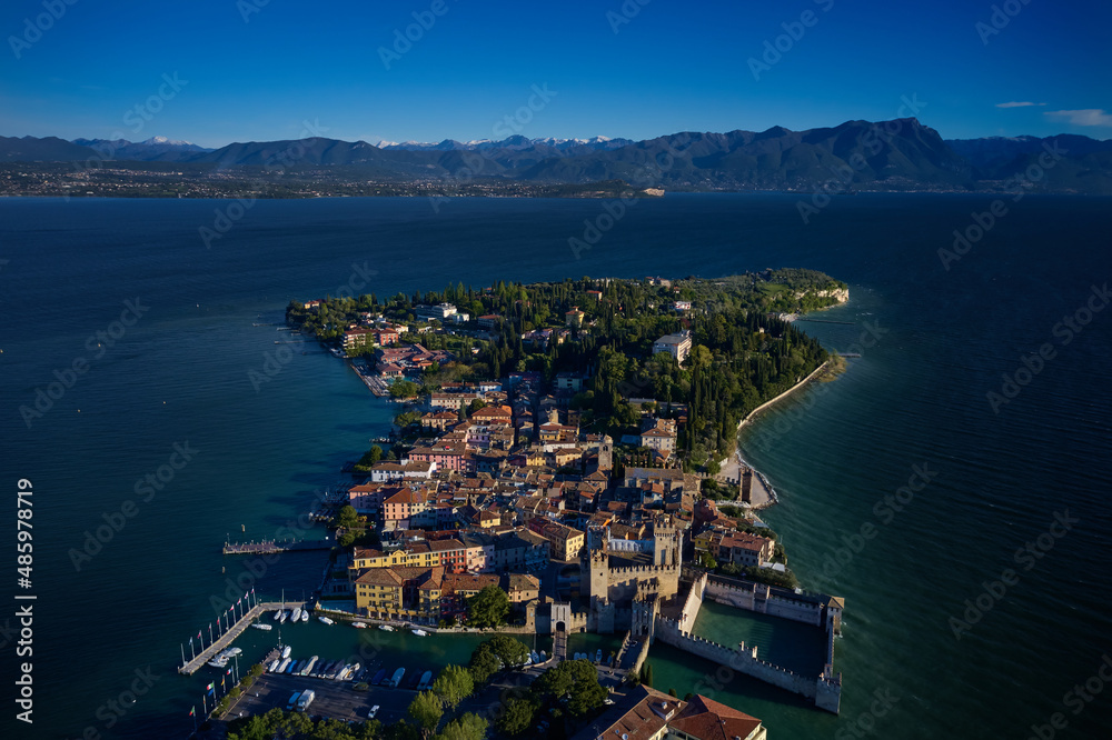 Italian castle on Lake Garda. Aerial panorama of Sirmione. Sirmione aerial view. Top view of the historic center of the Sirmione peninsula, lake garda. Lake Garda, Sirmione, Italy.