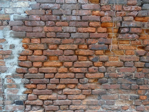 Old rough brick wall as background or texture 