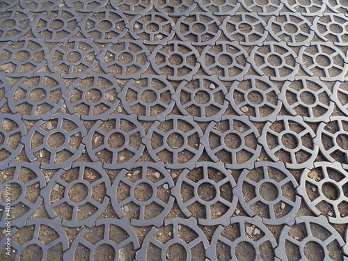 Metal pavement with an interesting pattern as a background 