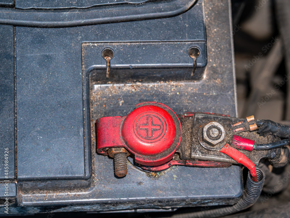 Red positive terminal with car battery wires. plus DC. Battery terminal