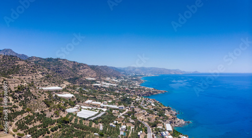 View of coastal city with mountain range