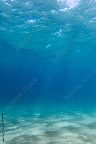 Underwater sea with reflection of sunlight on sand © bruno135_406