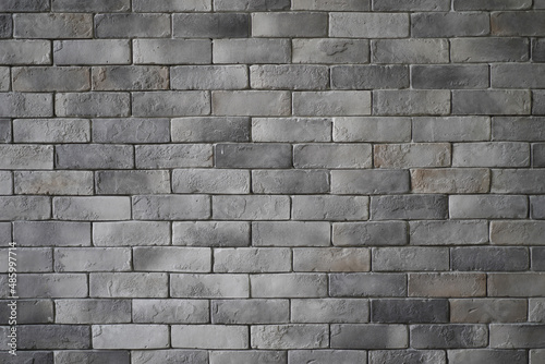 An image of a pattern of the rough grey bricks on a wall that can be presented both in the interior and exterior of an architecture
