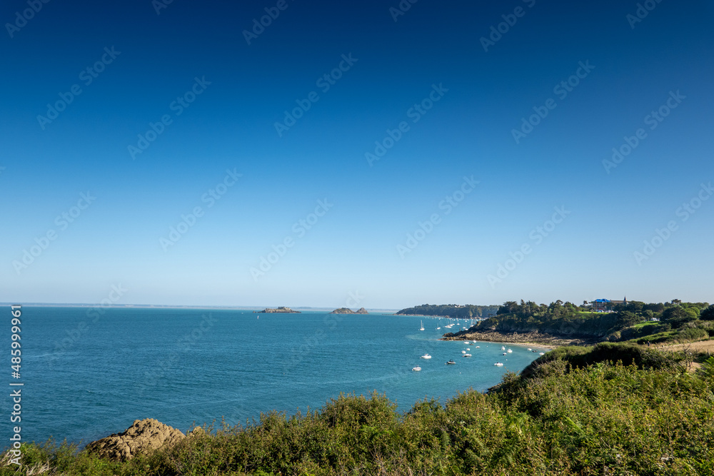 Scenic view of sailboats sailing on sea