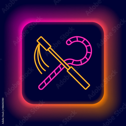 Glowing neon line Crook and flail icon isolated on black background. Ancient Egypt symbol. Scepters of egypt. Colorful outline concept. Vector