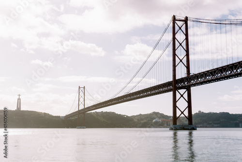 Landscape of the 25 April bridge and Christ the King statue in Lisbon  Portugal.