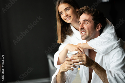 Handsome man and beautiful woman relaxing in spa