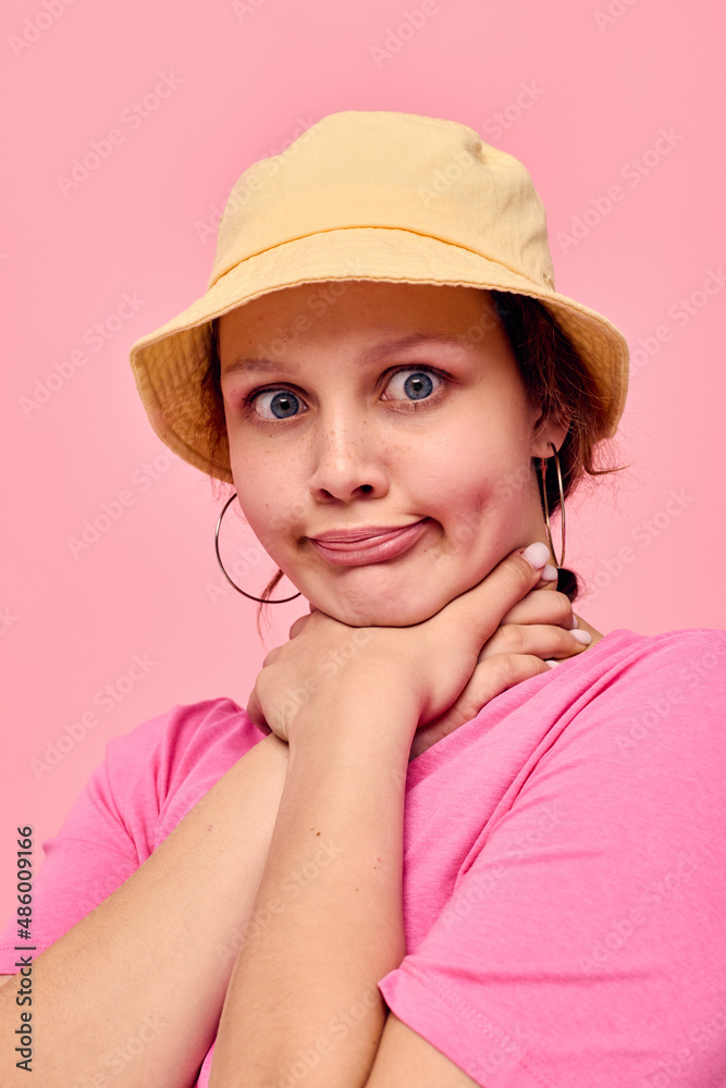 portrait of a young woman Youth clothing posing modern style pink background portrait of a young woman Youth clothing posing modern style pink background