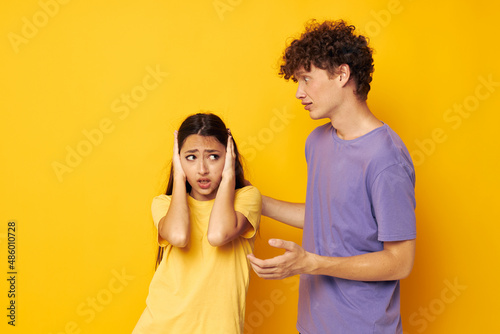 teenagers in colorful t-shirts posing friendship fun isolated background unaltered