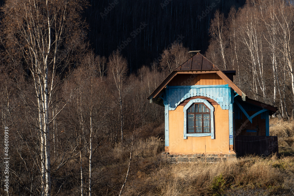 Ancient house in the autumn Siberian forest Ancient house in the autumn Siberian forest
