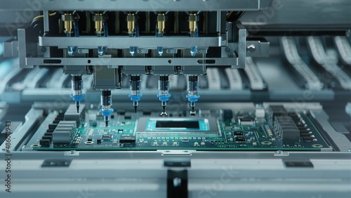 Automatic Pick and Place machine quickly installs Components on Generic Circuit Board. Electronics and Circuit board Manufacturing. Bright Environment