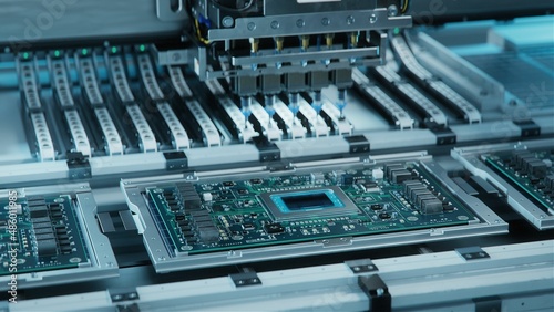 Shot of Generic Printed Circuit board with Microchips and other Components During Production Process. Electronics Manufacturing. Bright Environment