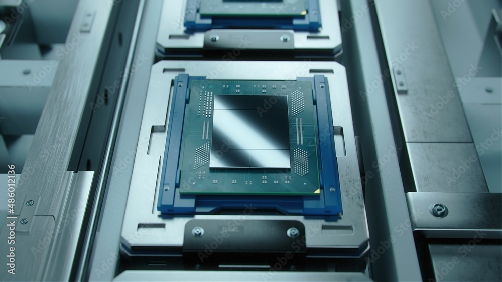 Advanced Computer Processor during Production at Semiconductor Foundry in Bright Environment. Advanced Computer Processor during Production at Semiconductor Foundry in Bright Environment.