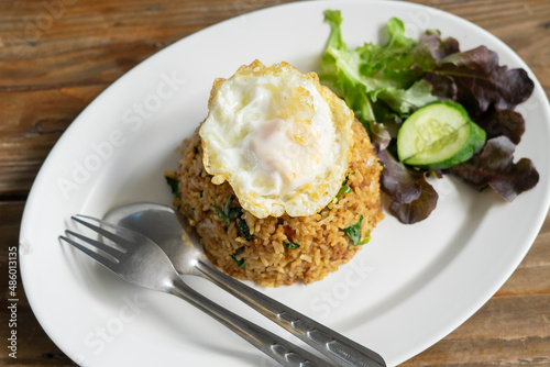 Rice topped with stir-fried pork and basil.Thai street food.Stir fried basil.